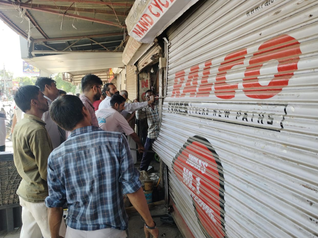 A punctured air filling tank at the bicycle shop outside the municipal council office.