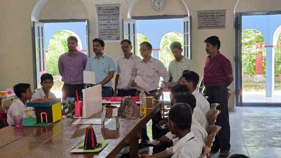 Science Exhibition: Deepak's model of a device to protect clothes from getting wet in the rain came first.