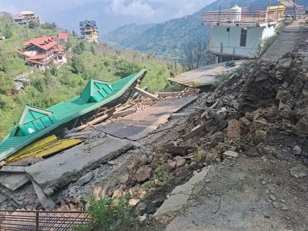 A three-storey house in Kumarsain's Karevathi Panchayat was razed to the ground.