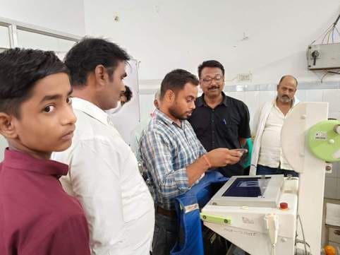 Taking a photo of the X-ray on your mobile and showing the report to the doctor