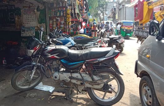 Encroachment has shrunk the city roads, causing traffic jams for pedestrians