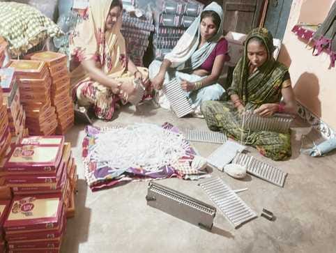 Women of the group are lighting up lives by making candles