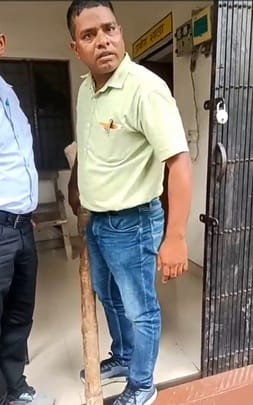 The veterinarian warned the cattle owner by showing him a stick.