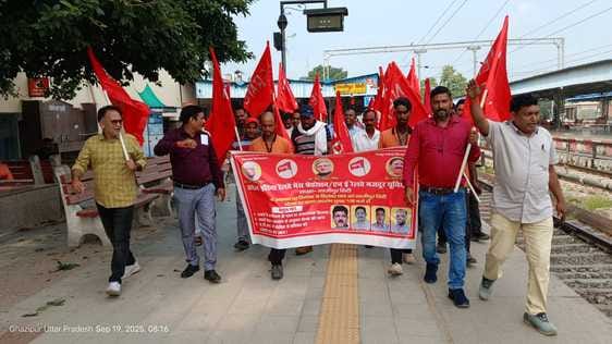 Railway workers staged a sit-in, took out a procession and raised slogans.