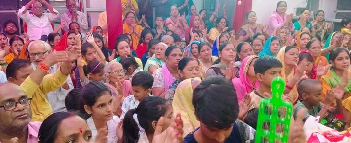 The devotees were thrilled after listening to the hymns.