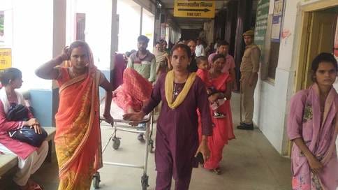 Attendants pulling stretchers, attendants resting
