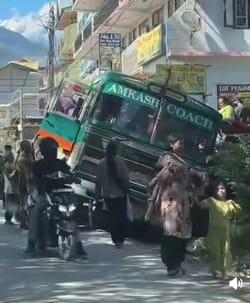 The bus fell into a drain near Aleu and became crooked.