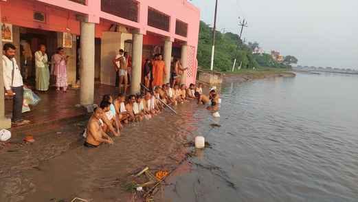 The ancestors were bid farewell by donating water and performing tarpan.