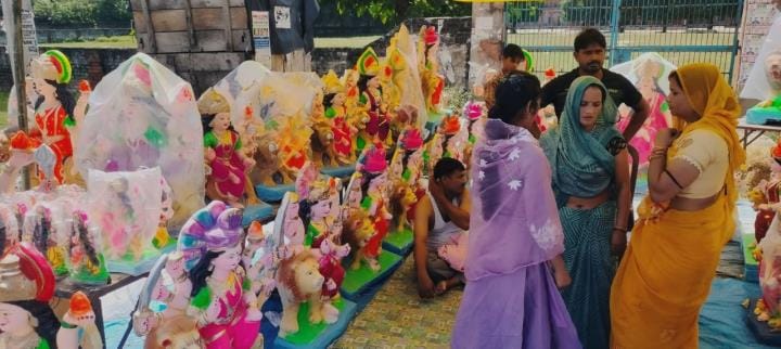 The market is decorated with idols and costumes of goddesses during Navratri.