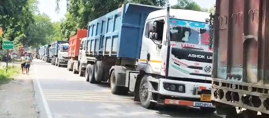 A gravel-laden trailer overturned, leaving traffic stranded on Dalmau Road for seven hours.