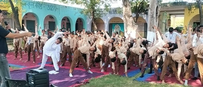 Students practiced yoga in the government school