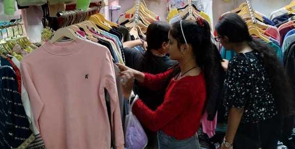 Colourful apparel adorns textile markets, prompting traders to expect better business.