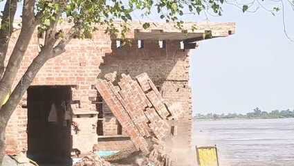 Four houses were swallowed by the Ganges River, two were left half-hanging