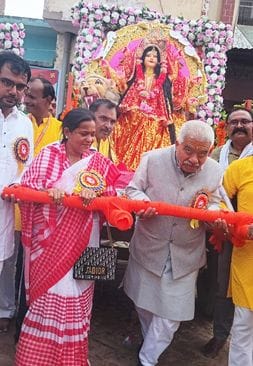 The minister inaugurated the procession by pulling the chariot of Goddess Bhagwati.