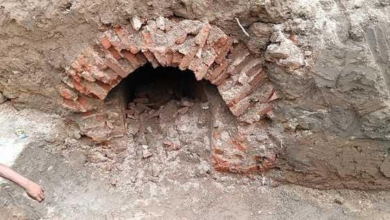 An ancient narrow passage was found during the excavation of the foundation of the circumambulation path in the corridor