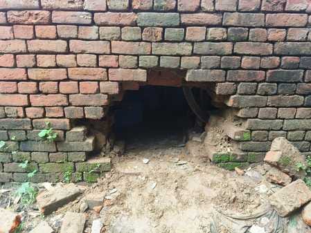 theft by breaking into the wall