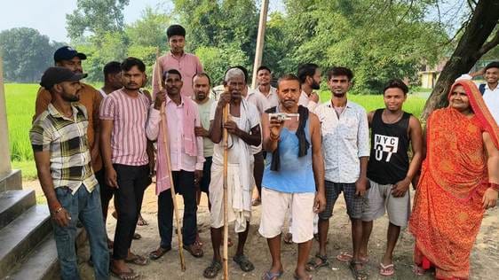 Villagers brought down the drone by hitting it with bricks.