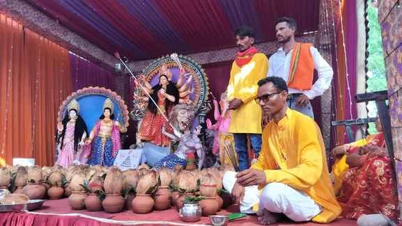Idols of the Mother Goddess were installed in the pandals and prayers began.