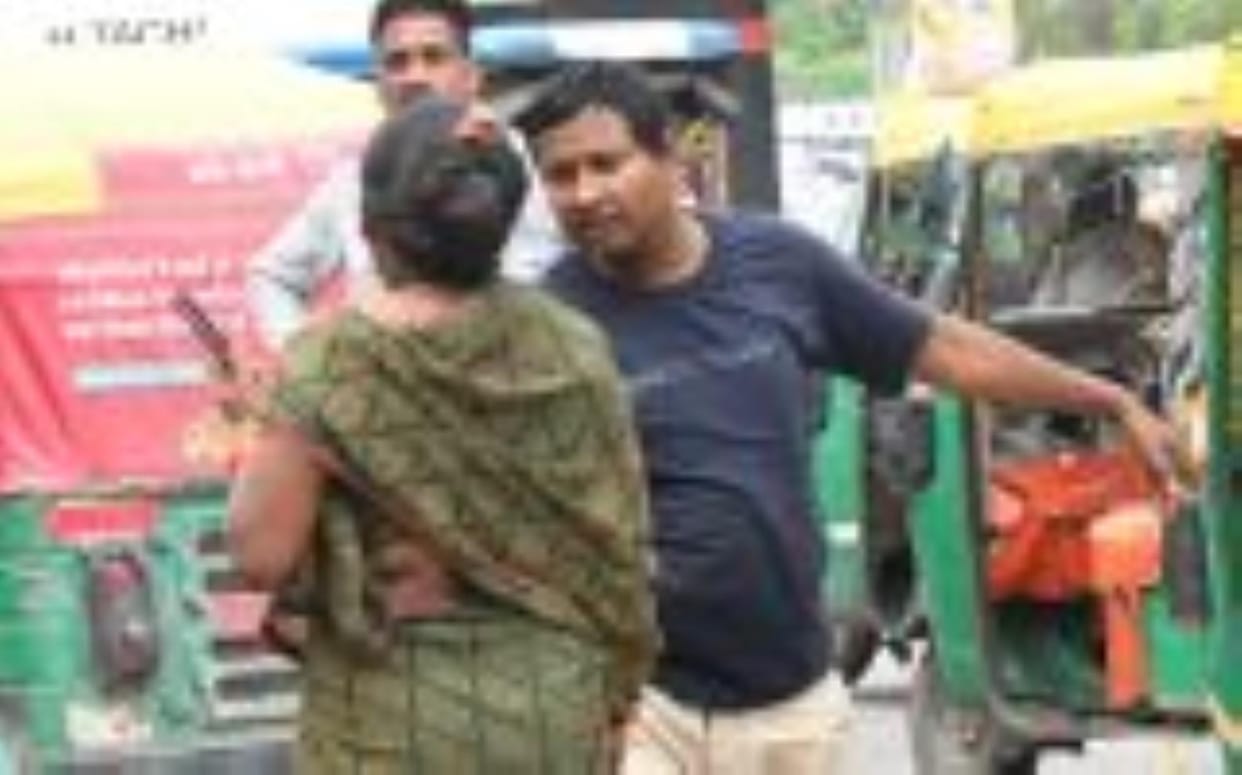 Auto drivers surround themselves as soon as they see a female passenger