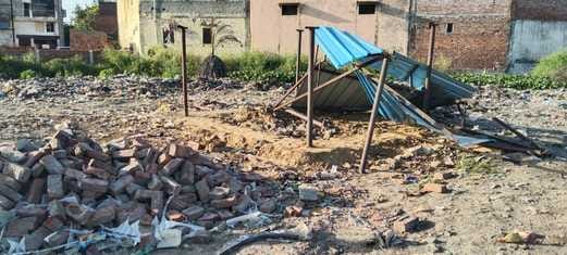 Construction work at the crematorium was halted and the tin shed was demolished.