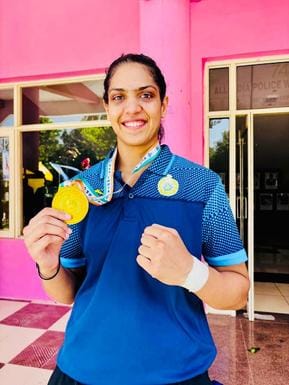 Sneha won gold medal in boxing