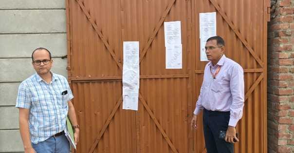Firm fails to pay GST, notice of attachment pasted on property