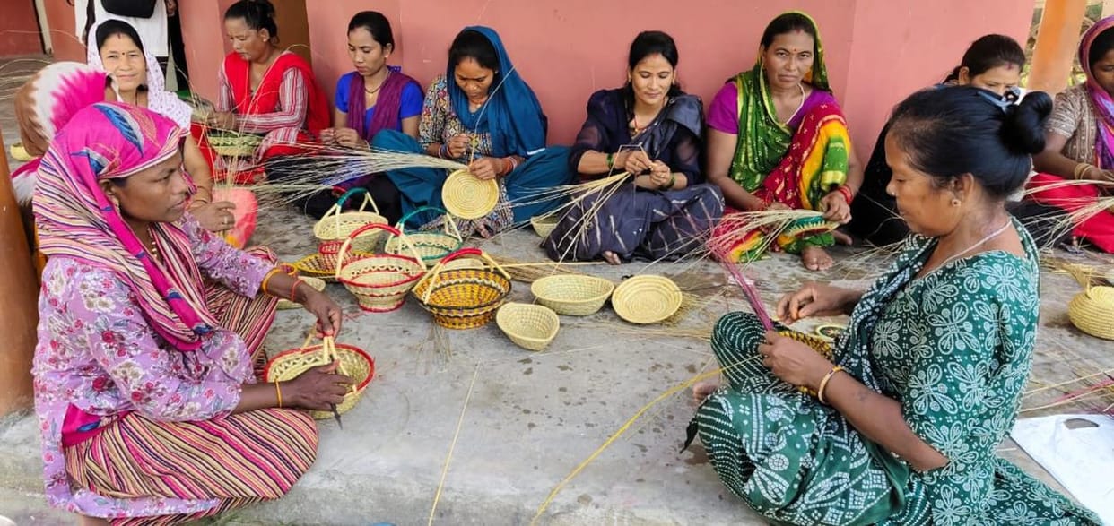Sungnati from Nepal is teaching Tharu women the Munj craft.