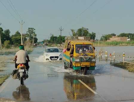 The floods have receded, but water still fills homes, streets and fields