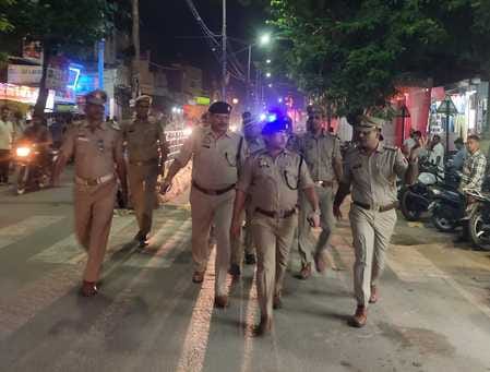 Police personnel along with SP did a foot march