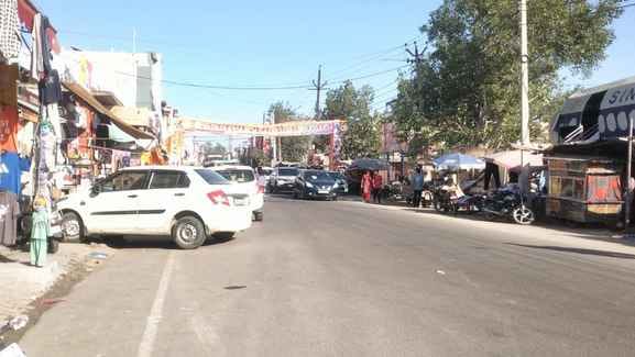 Drivers are parking their vehicles on the roads despite having parking space.