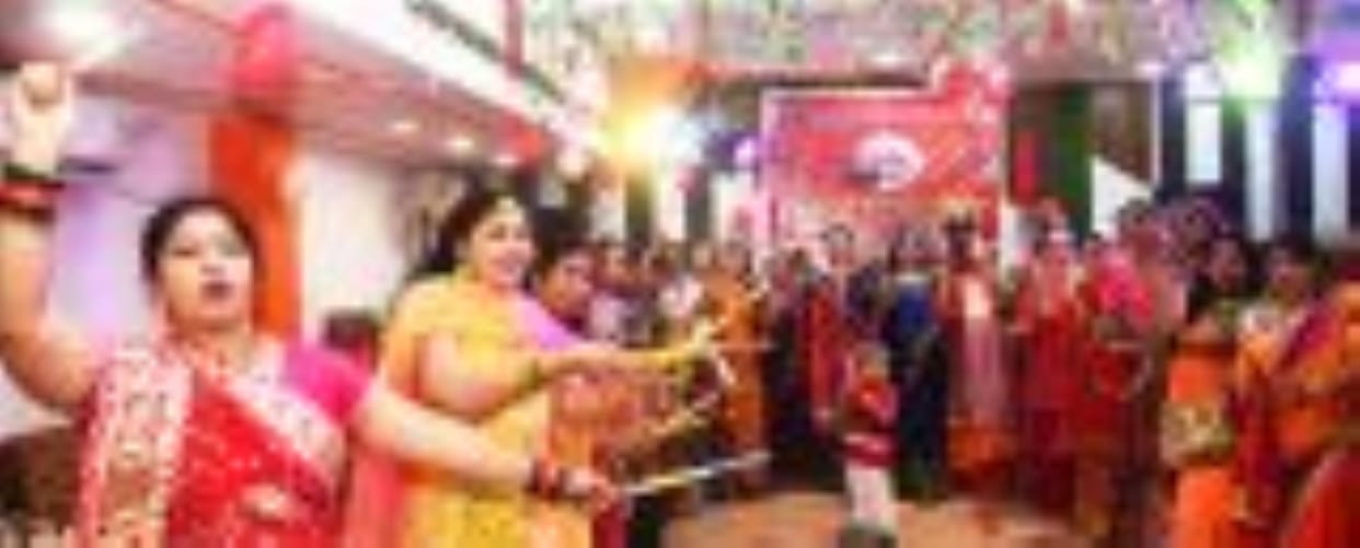 Women danced to devotional songs at the Dandiya Night.