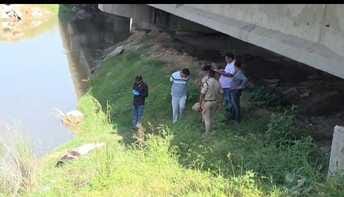 The body of a young woman was found in Drain 8, with the inscription "SN" on her hand.