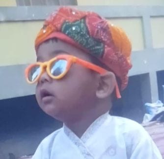 An innocent child playing outside his house was crushed to death by a tractor trolley.