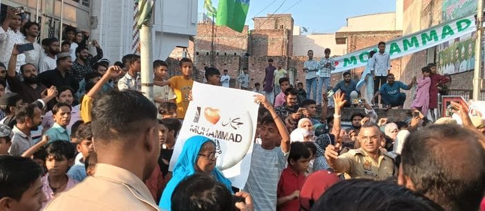 Crowds took to the streets after the removal of I Love Muhammad posters.