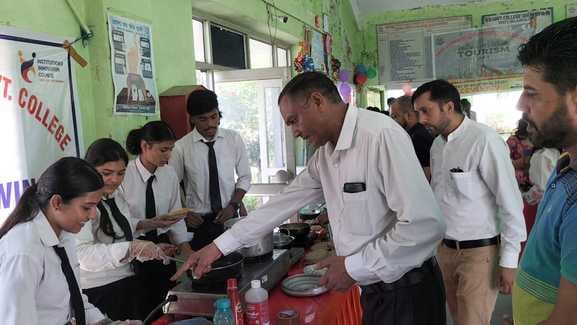 Students set up a food stall in the college campus.