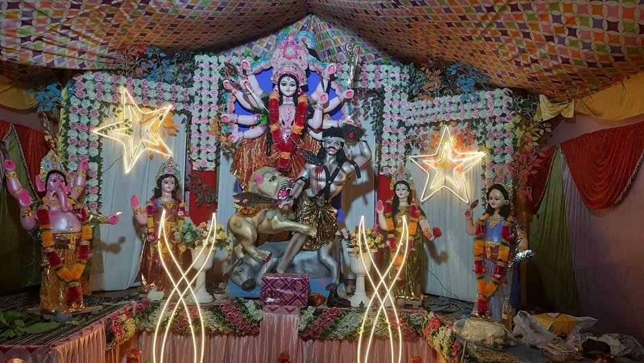 Devotees throng Durga pandals, chants of praise for the goddess echo.