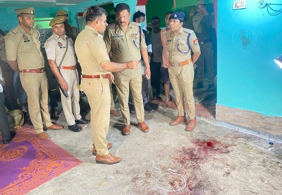 A young man was shot dead for not being invited to a party; the husband of the accused village headman was arrested.