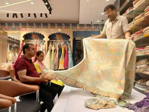 Hand-woven Kanjeevaram sarees are a craze among women, priced at Rs 12,000.