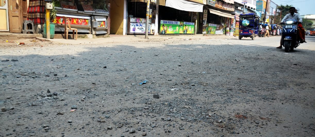 Roads uprooted in the rain...passersby are jolted
