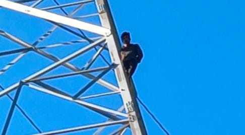 Upset over not getting married, a young man climbed an electricity tower in his girlfriend's village.