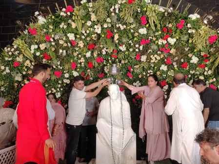Sai Baba was anointed with 1008 litres of Panchamrit.