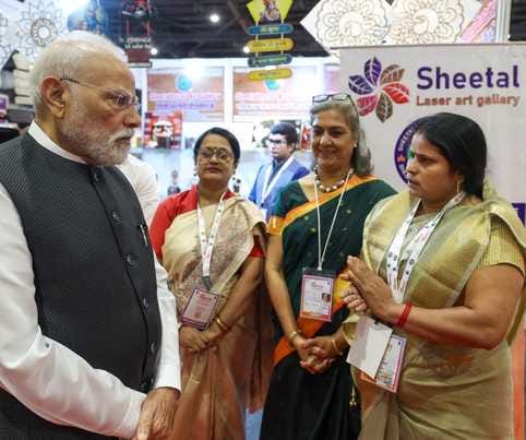 Prime Minister Narendra Modi praised the replica of temples and the wooden trophy.