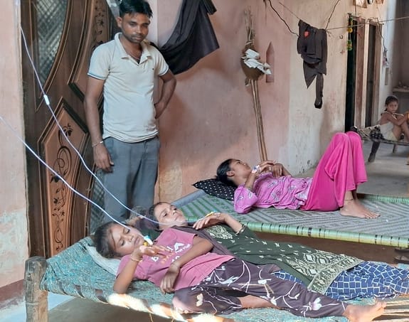 Hundreds of people are sick in two villages, needing treatment.