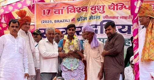 Sagar receives a grand welcome after returning from the World Wushu Championship with a bronze medal.