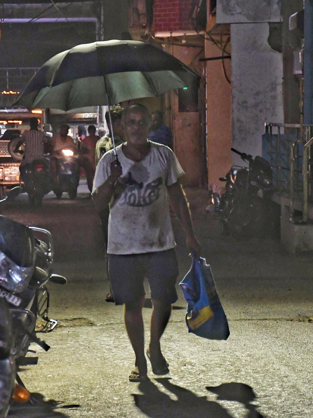 Hot and humid day, light rain in the evening