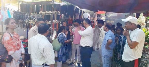 Uproar over illegal collection at weekly fair, shopkeepers protest