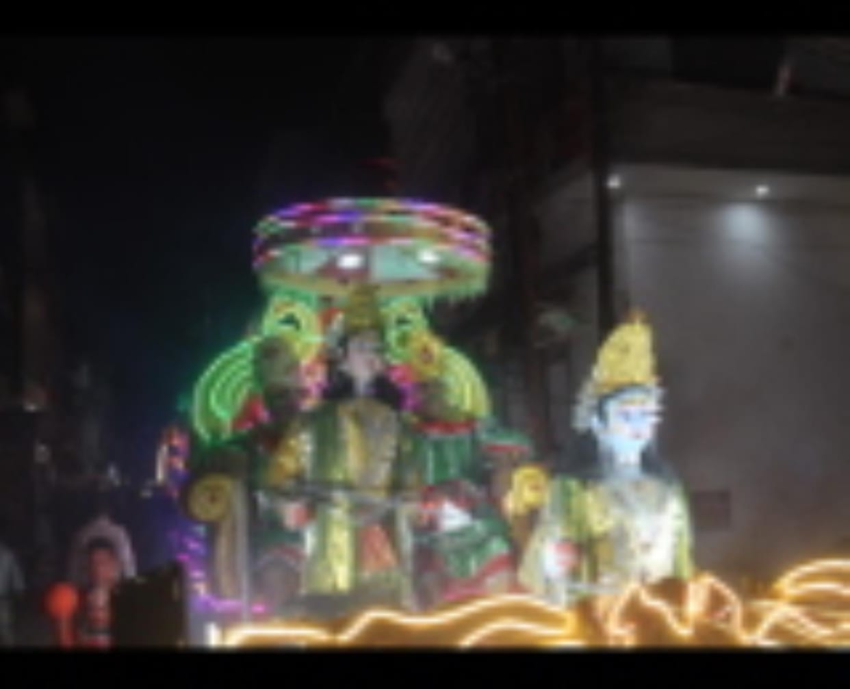 Crowds gathered to see Hanuman ji's procession, cheers echoed.