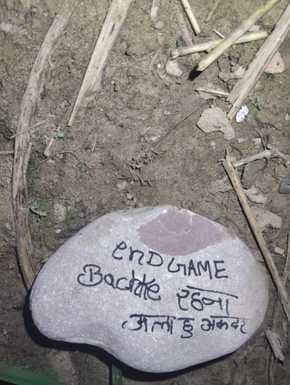 Stones with slogans of a particular religion were thrown at houses, police said it was a prank by children.