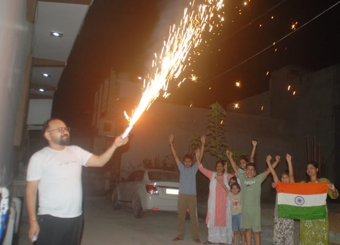 Cricket fans celebrate India's victory in the Asia Cup final