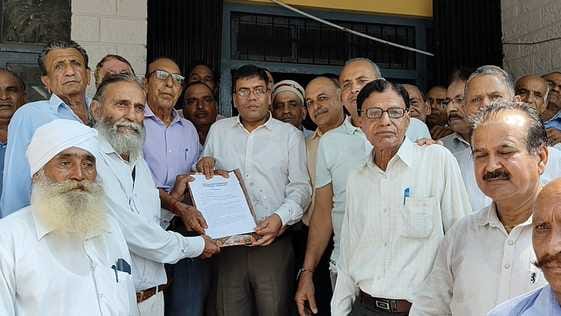 Pensioners expressed their anger by taking out a rally in Ghumarwin.